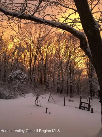 a view of outdoor space with a slide