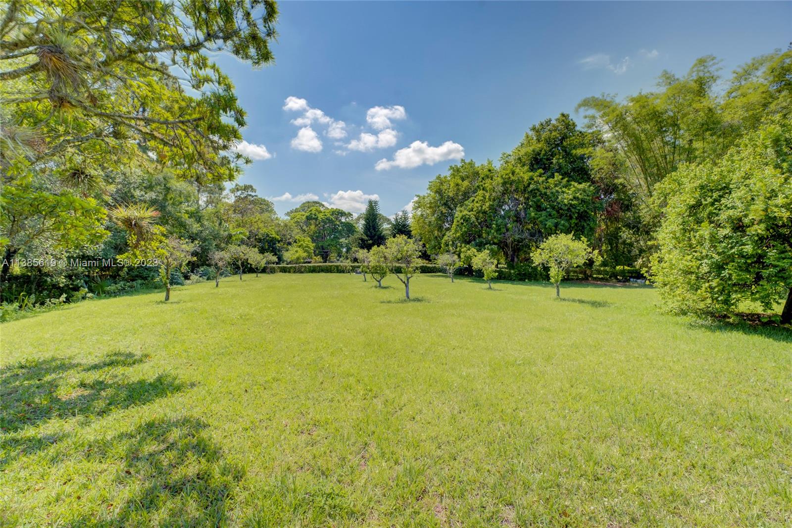 915 B Road Loxahatchee, FL 33470 - Photo 25 of 42 a front view of a house with a yard