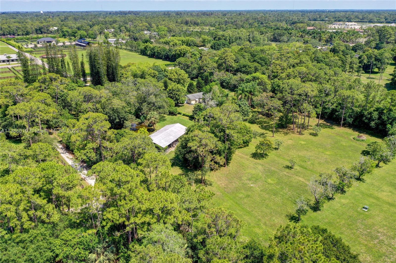 915 B Road Loxahatchee, FL 33470 - Photo 40 of 42 a view of a lake with a city