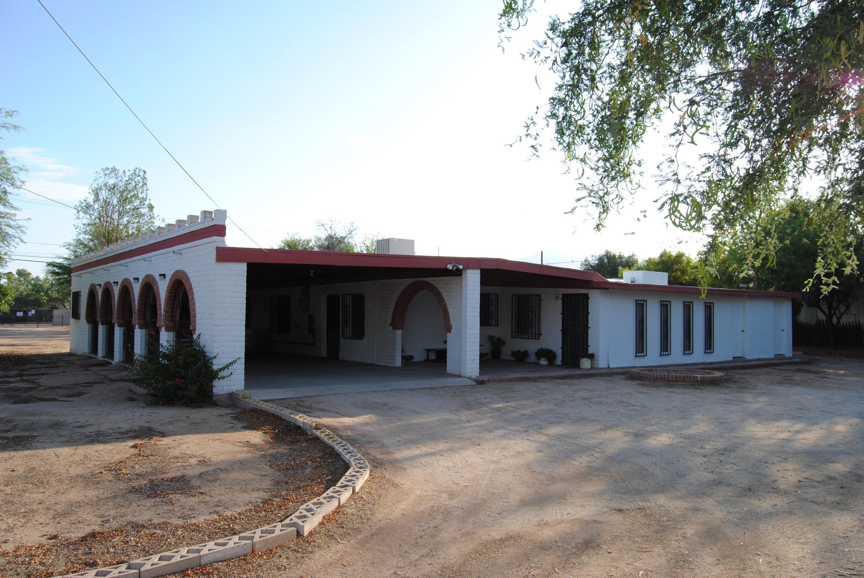 1607 West Roger Road Tucson, AZ 85705 - Photo 13 of 14 a view of a small house