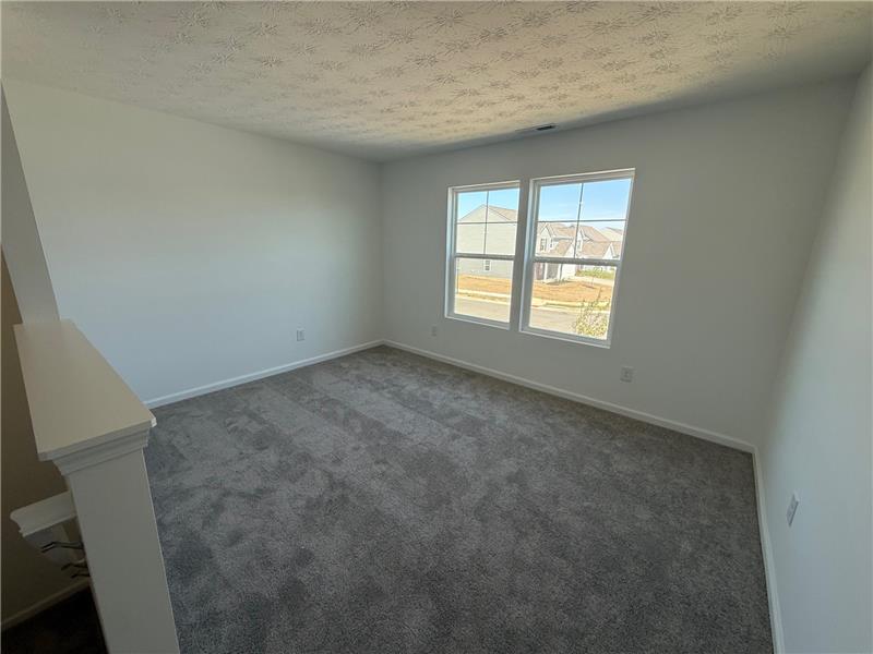 4005 Chakeres Avenue Springfield, OH 45505 - Photo 10 of 19 This versatile bonus room offers ample space for various uses, bathed in natural light.