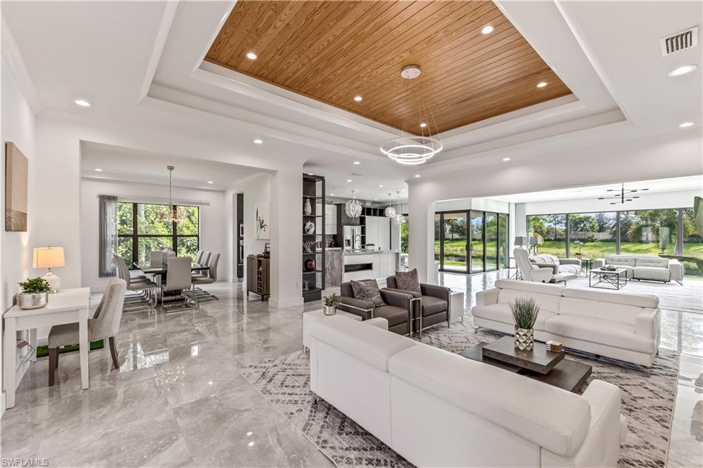 4410 Caldera Circle Naples, FL 34119 - Photo 10 of 30 a living room with furniture