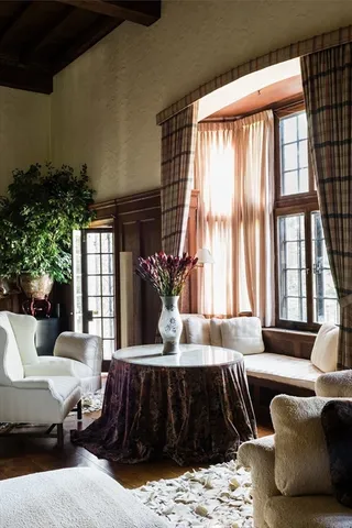 a front view of a house with wooden floor