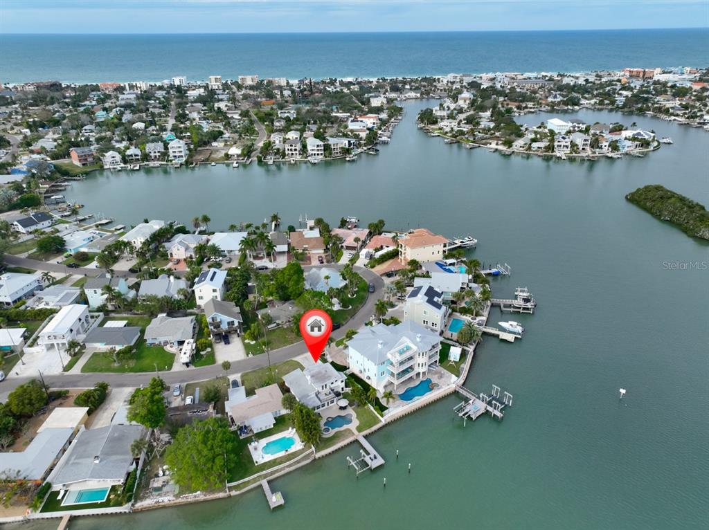 387 12th Avenue Indian Rocks Beach, FL 33785 - Photo 15 of 44 an aerial view of a house with a floor to dining table & chairs