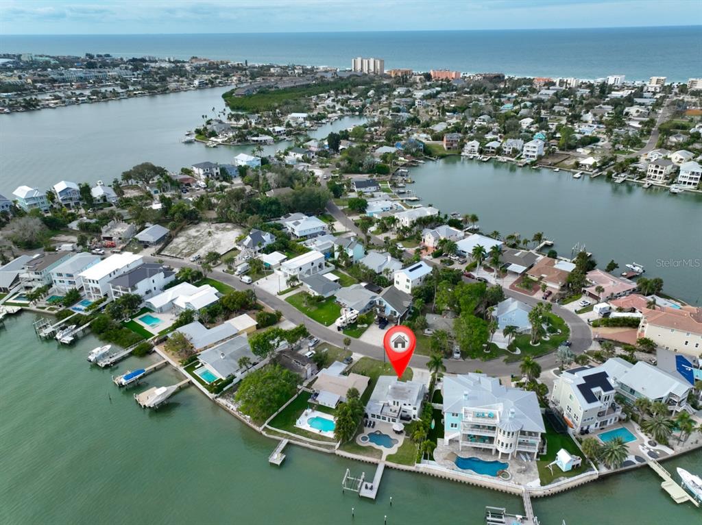 387 12th Avenue Indian Rocks Beach, FL 33785 - Photo 16 of 44 an aerial view of residential houses with outdoor space and lake view