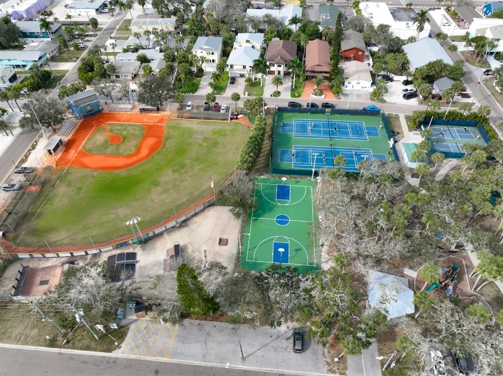 387 12th Avenue Indian Rocks Beach, FL 33785 - Photo 17 of 44 an aerial view of a house with a swimming pool