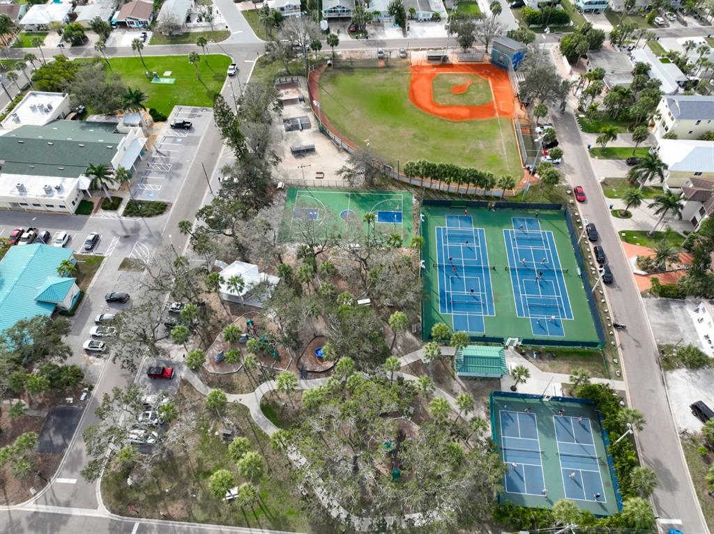 387 12th Avenue Indian Rocks Beach, FL 33785 - Photo 18 of 44 an aerial view of residential house with outdoor space and swimming pool