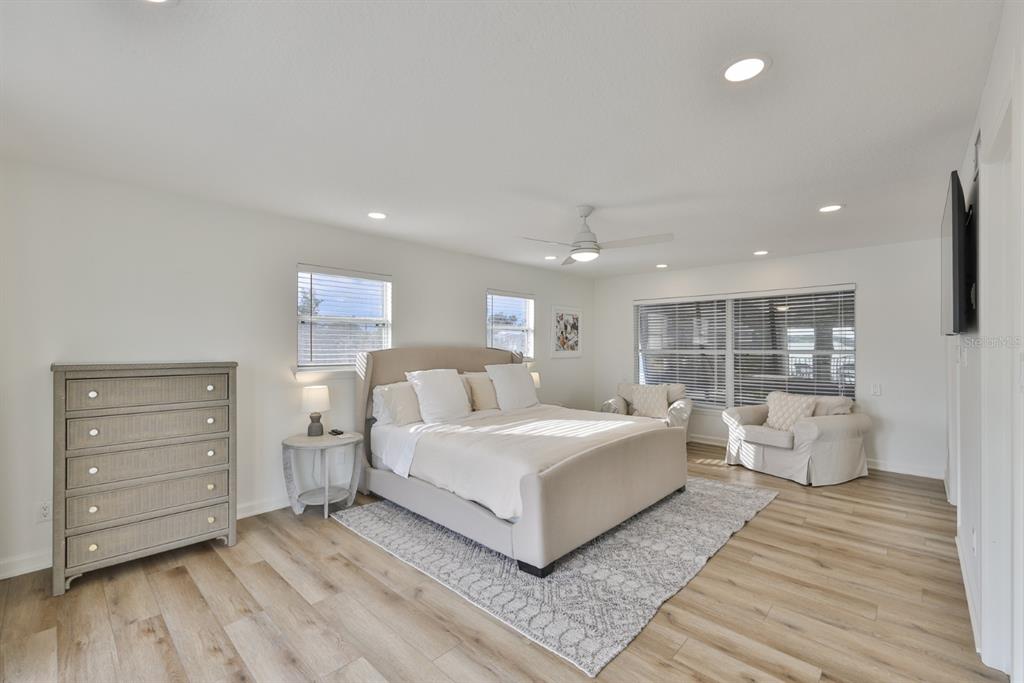 387 12th Avenue Indian Rocks Beach, FL 33785 - Photo 33 of 44 a bed room with a bed and a large window