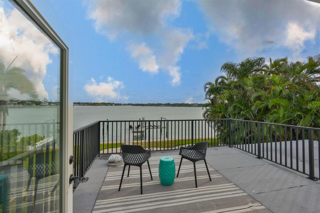 387 12th Avenue Indian Rocks Beach, FL 33785 - Photo 36 of 44 a view of balcony with wooden floor