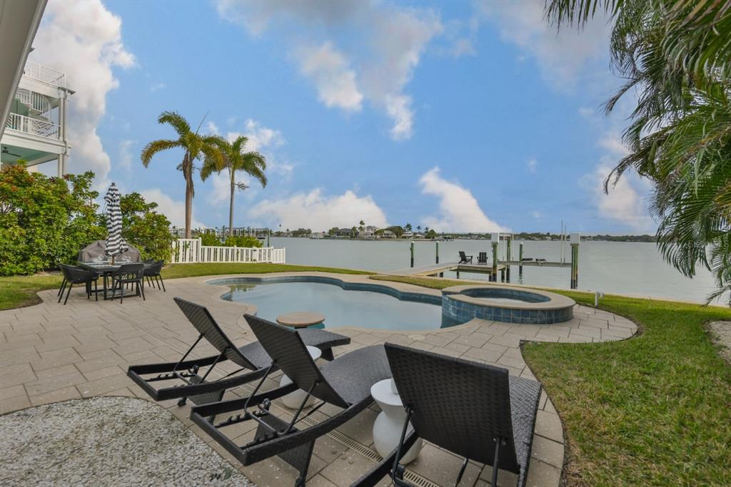 387 12th Avenue Indian Rocks Beach, FL 33785 - Photo 6 of 44 a view of swimming pool with outdoor seating and plants