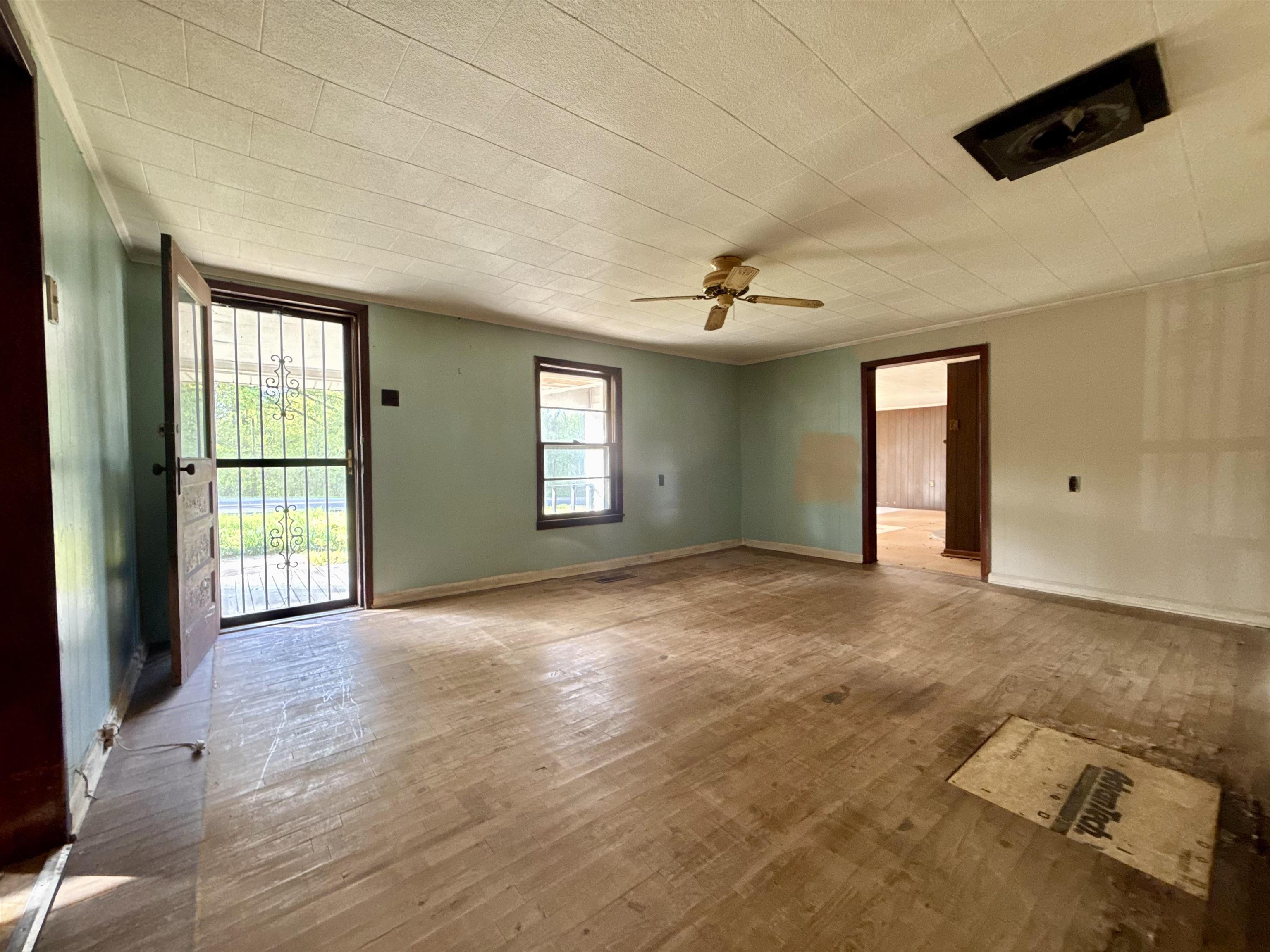 845 Needham Road Drummonds, TN 38023 - Photo 5 of 22 Empty room featuring hardwood / wood-style flooring and ceiling fan