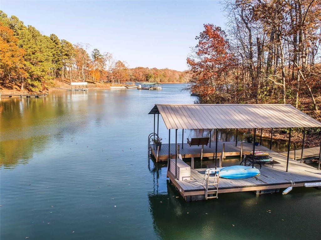 211 Rock Creek Road Anderson, SC 29625 - Photo 4 of 49 Covered dock with lights and water