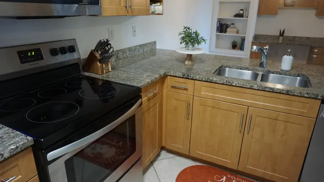 a close view of a utility room with dryer and washer