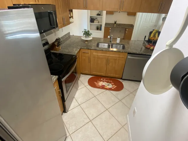 a bedroom with a bed and a mirror