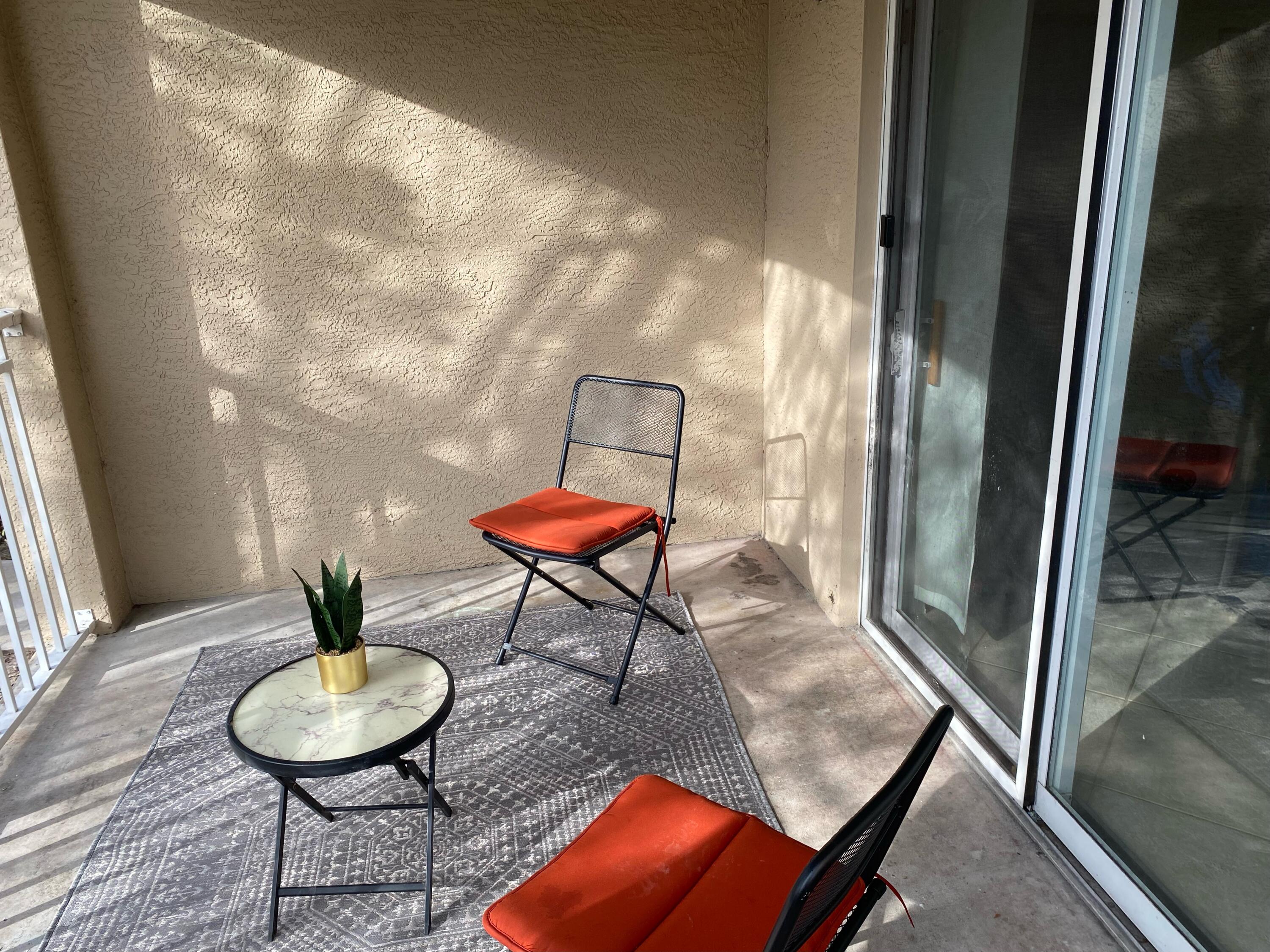 6511 Emerald Dunes Drive, Unit 208 West Palm Beach, FL 33411 - Photo 20 of 51 a room with furniture and a window