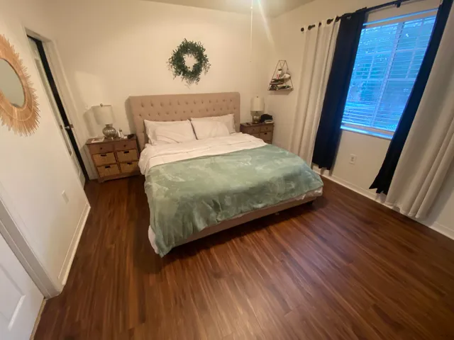 a bathroom with a glass shower door