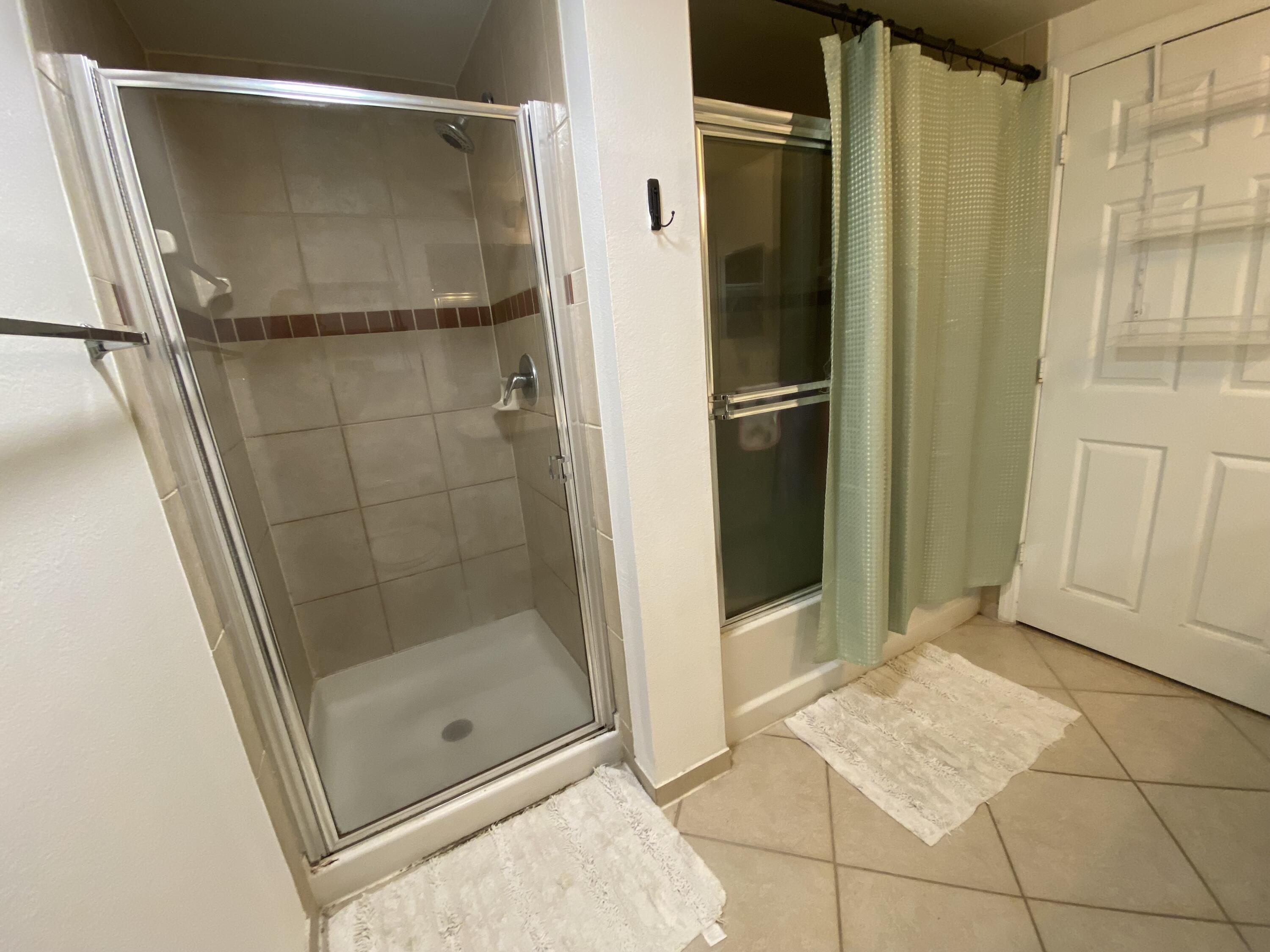 6511 Emerald Dunes Drive, Unit 208 West Palm Beach, FL 33411 - Photo 24 of 51 a bathroom with a shower