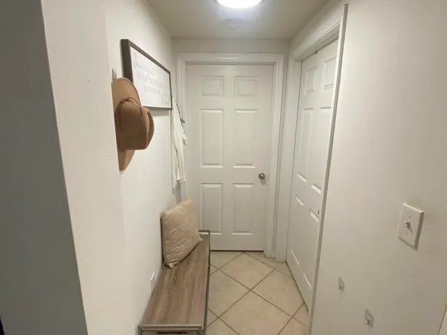 a house view with a sitting space and garden