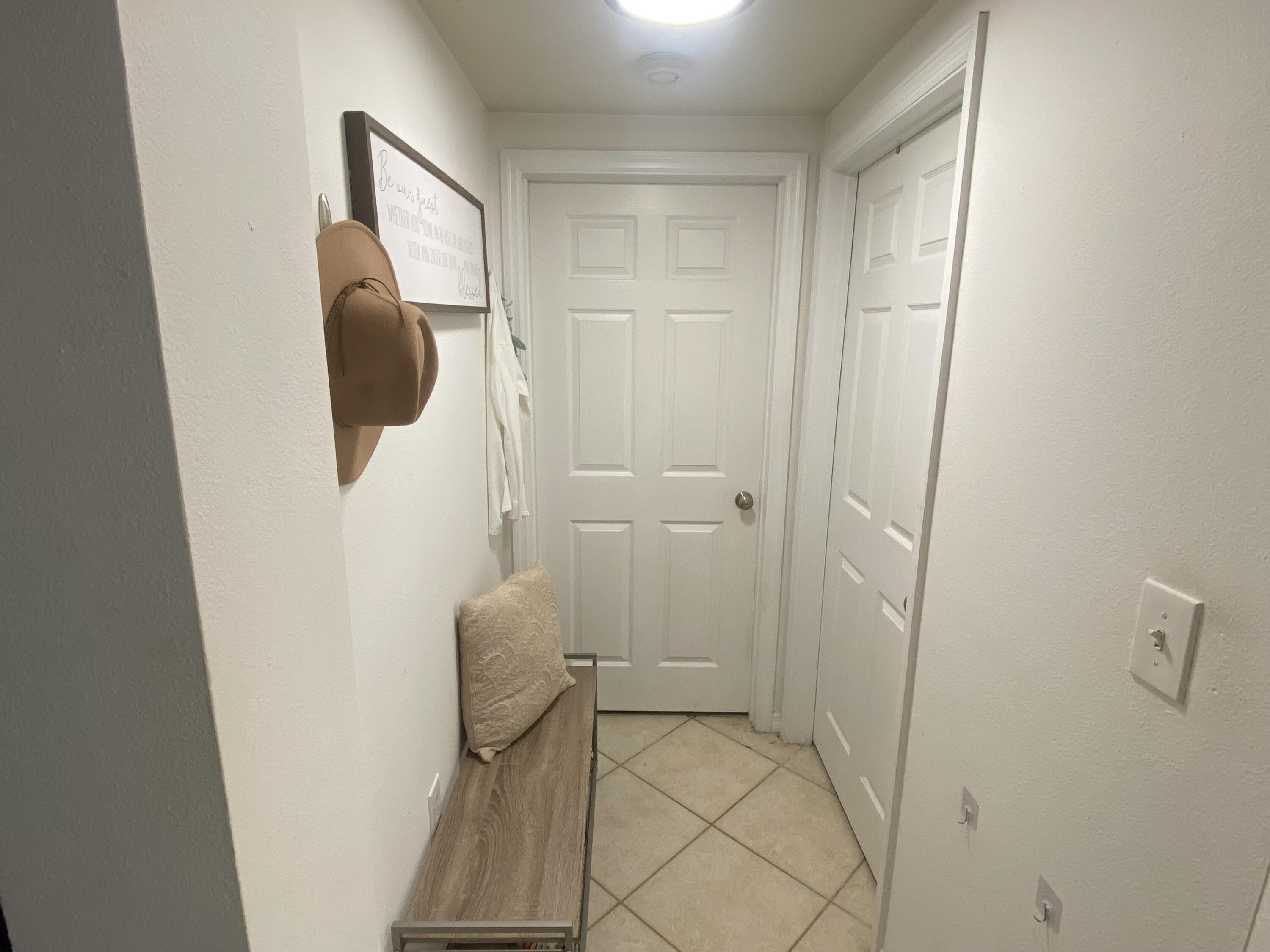 6511 Emerald Dunes Drive, Unit 208 West Palm Beach, FL 33411 - Photo 41 of 51 a bathroom with a shower and toilet