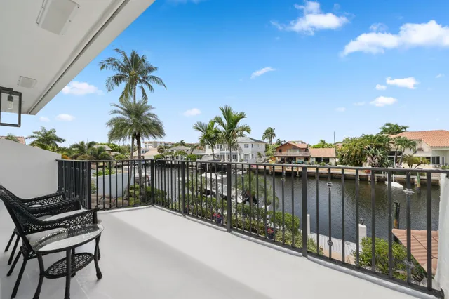 an aerial view of a house with outdoor space