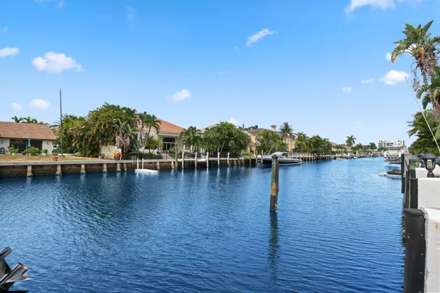 swimming pool view with a garden space