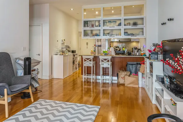 a view of a kitchen with workspace and a window
