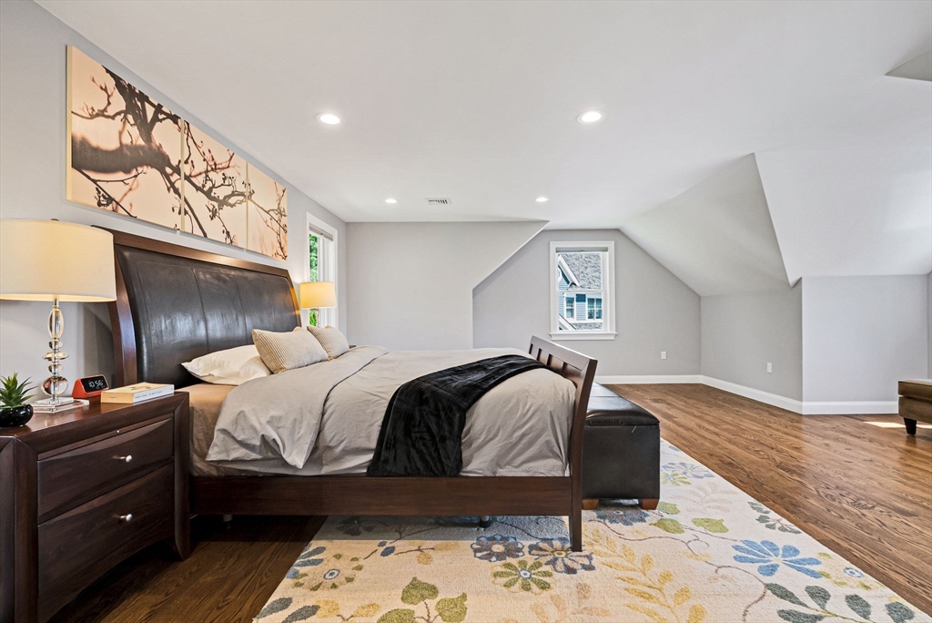 17 Sunrise Terrace Needham, MA 02492 - Photo 16 of 42 a bedroom with a bed and wooden floor