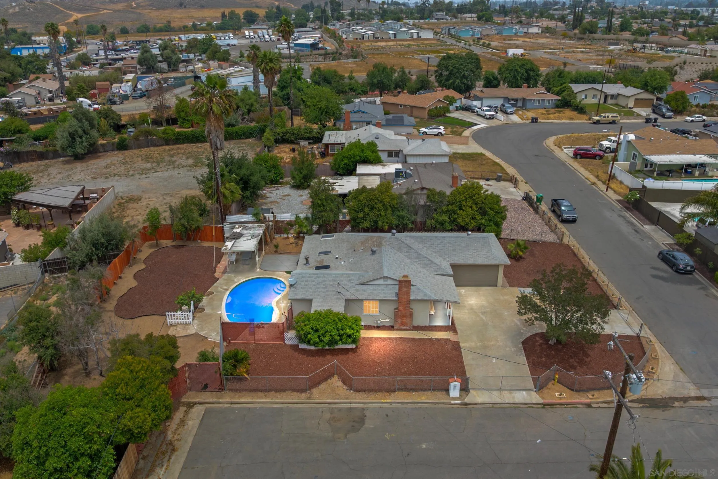 3563 Cannes Avenue Riverside, CA 92501 - Photo 1 of 21 an aerial view of a city with lots of residential buildings