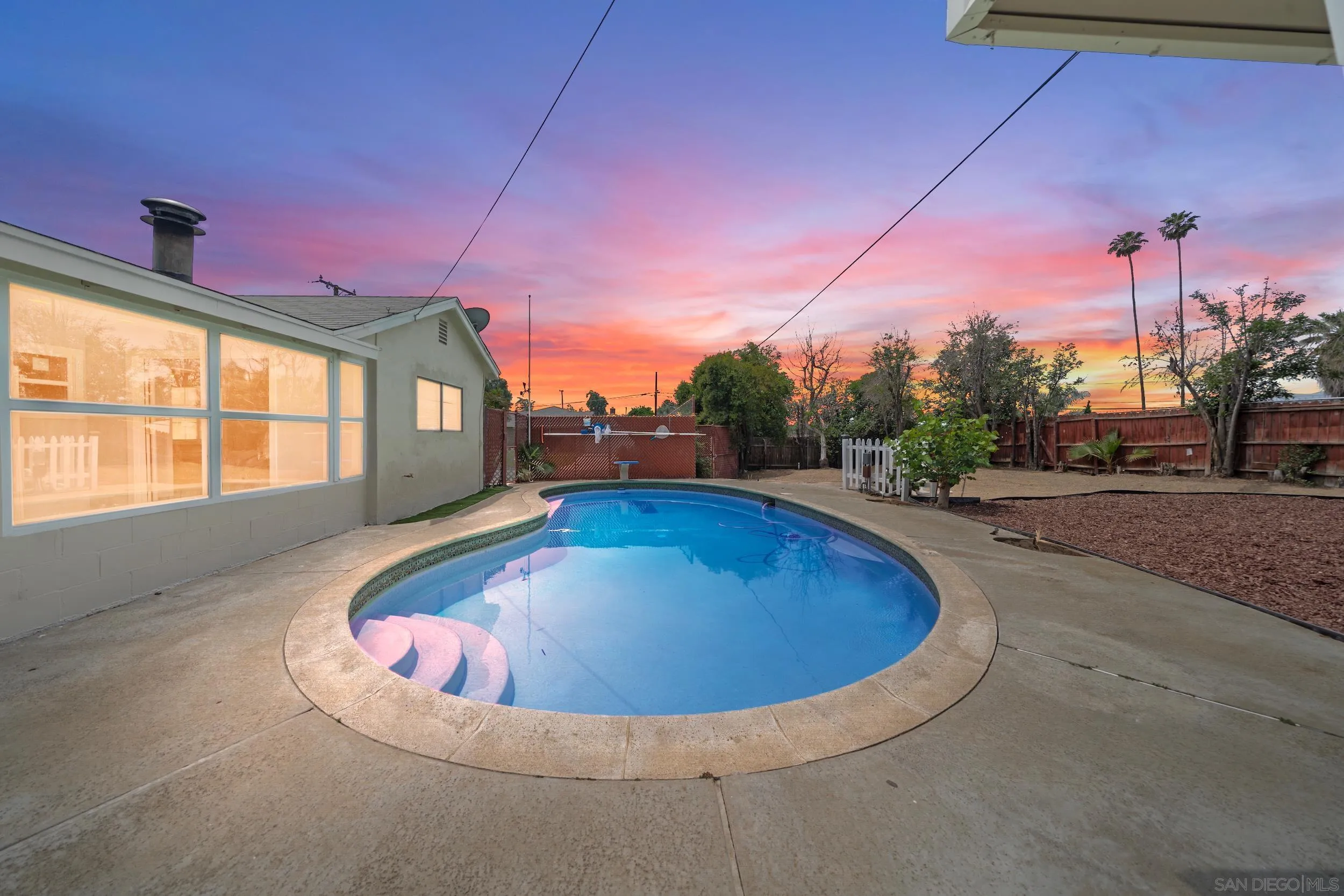 3563 Cannes Avenue Riverside, CA 92501 - Photo 2 of 21 a view of a swimming pool with a patio
