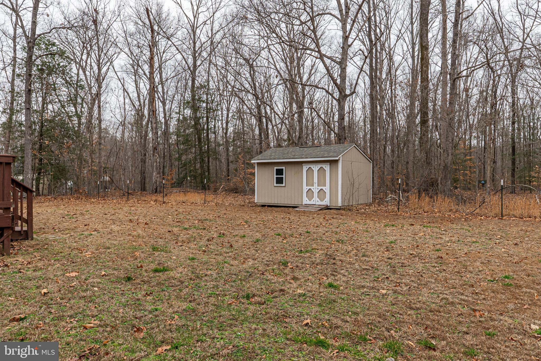 20045 Courtney Road Hanover, VA 23069 - Photo 20 of 21 a house with trees in front of it