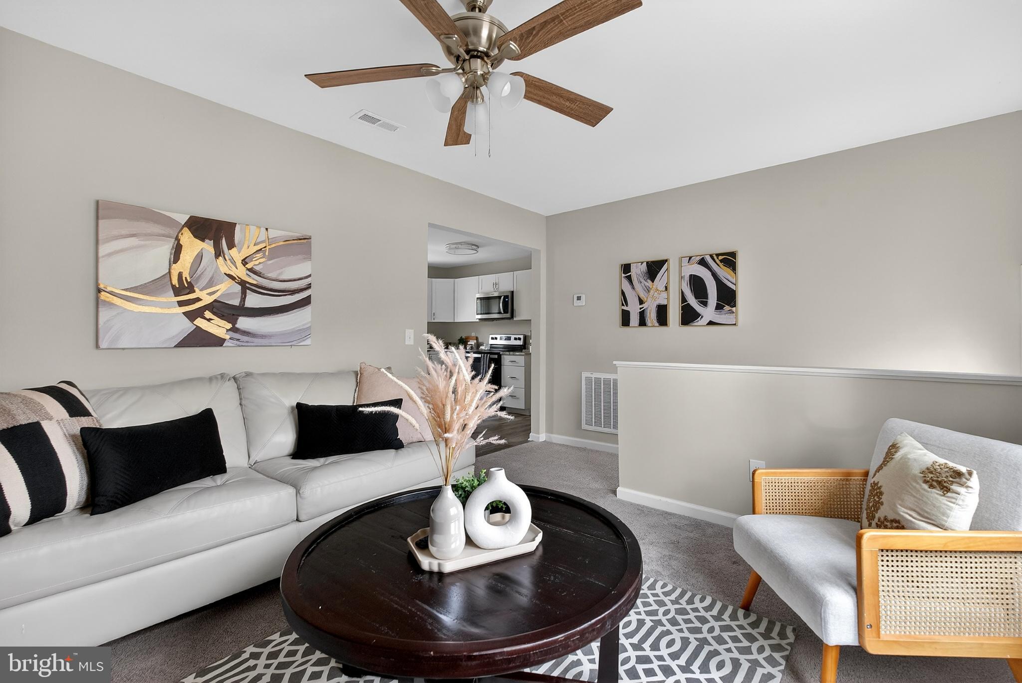 20045 Courtney Road Hanover, VA 23069 - Photo 2 of 21 a living room with furniture and a wooden floor
