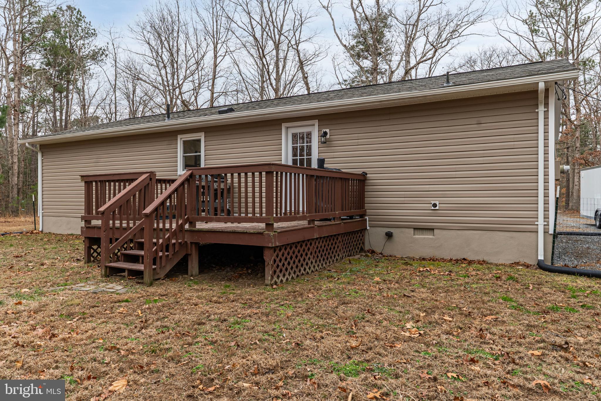 20045 Courtney Road Hanover, VA 23069 - Photo 21 of 21 a view of a house with a yard and deck area