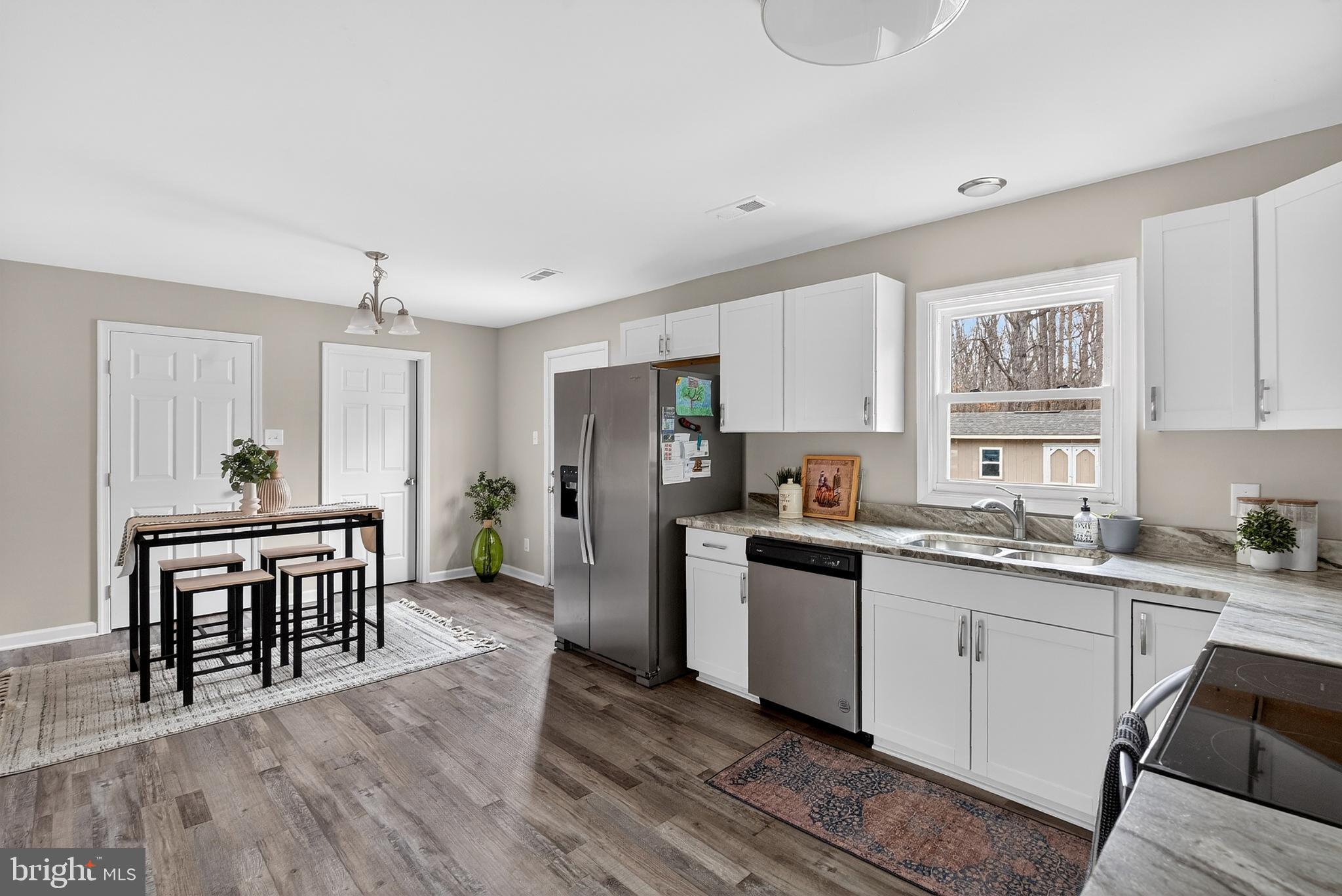 20045 Courtney Road Hanover, VA 23069 - Photo 4 of 21 a kitchen with a sink cabinets and wooden floor