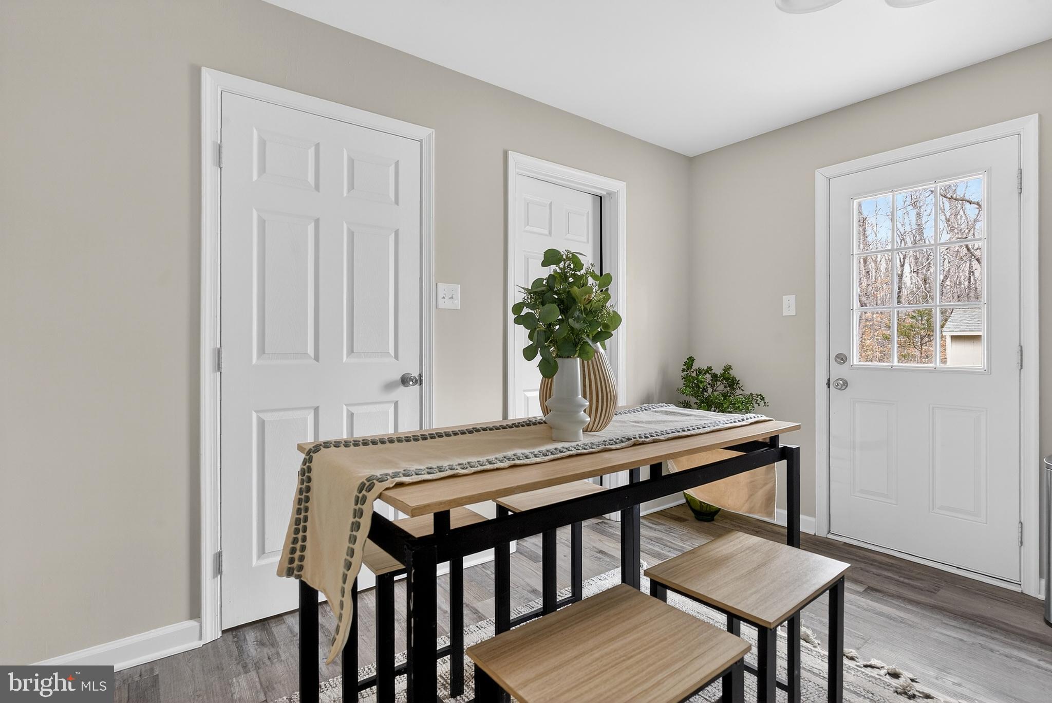20045 Courtney Road Hanover, VA 23069 - Photo 8 of 21 a view of a dining room with furniture and window