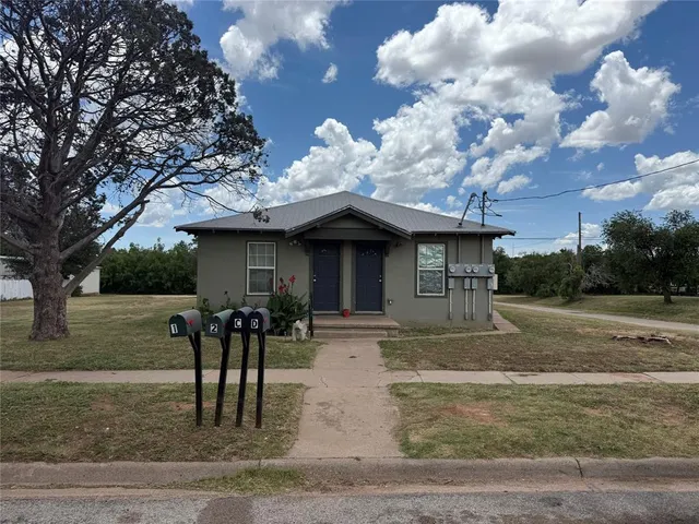 a front view of a house with porch