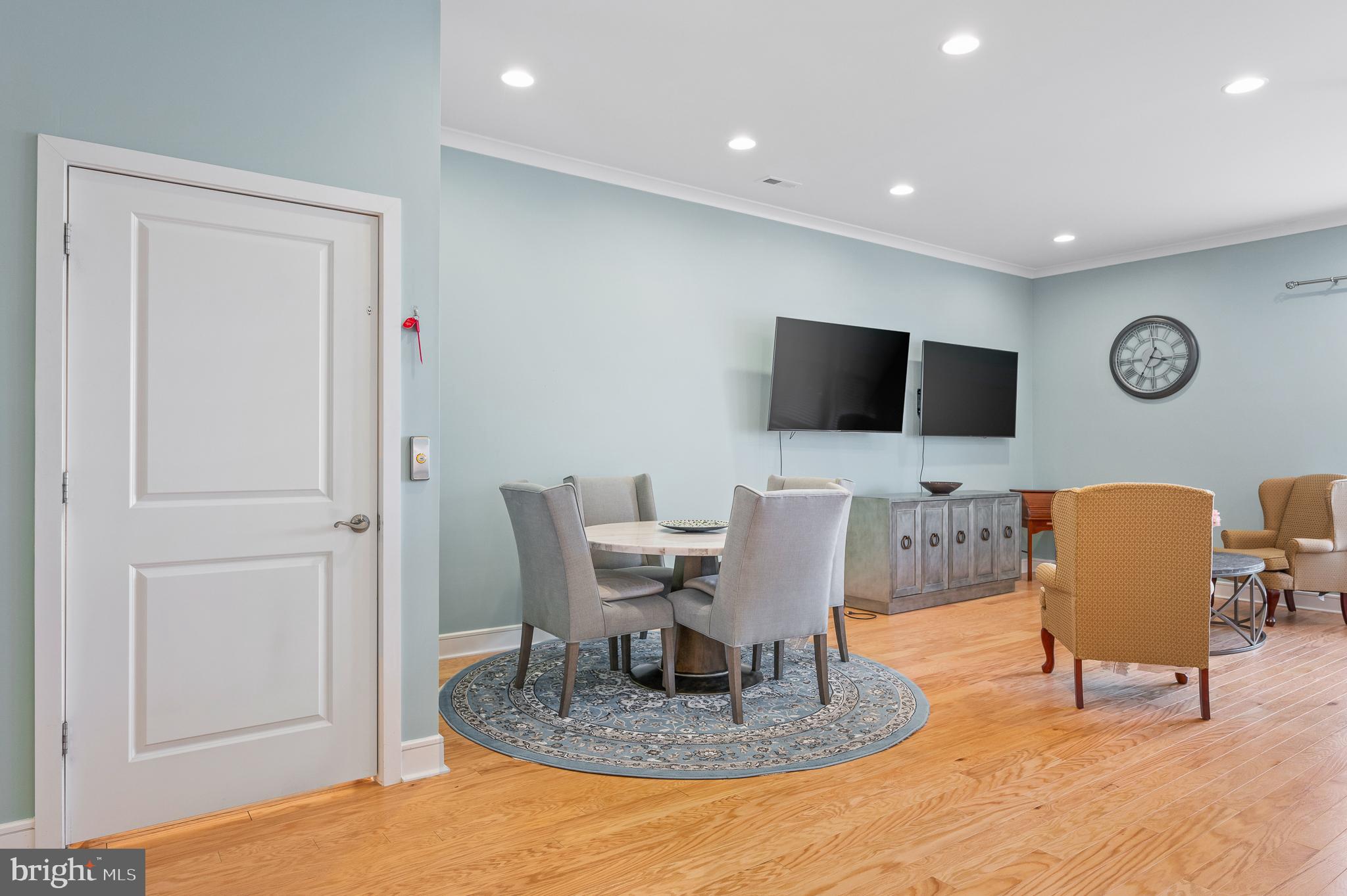 42791 Macbeth Terrace Ashburn, VA 20148 - Photo 13 of 63 a work room with furniture and a flat screen tv