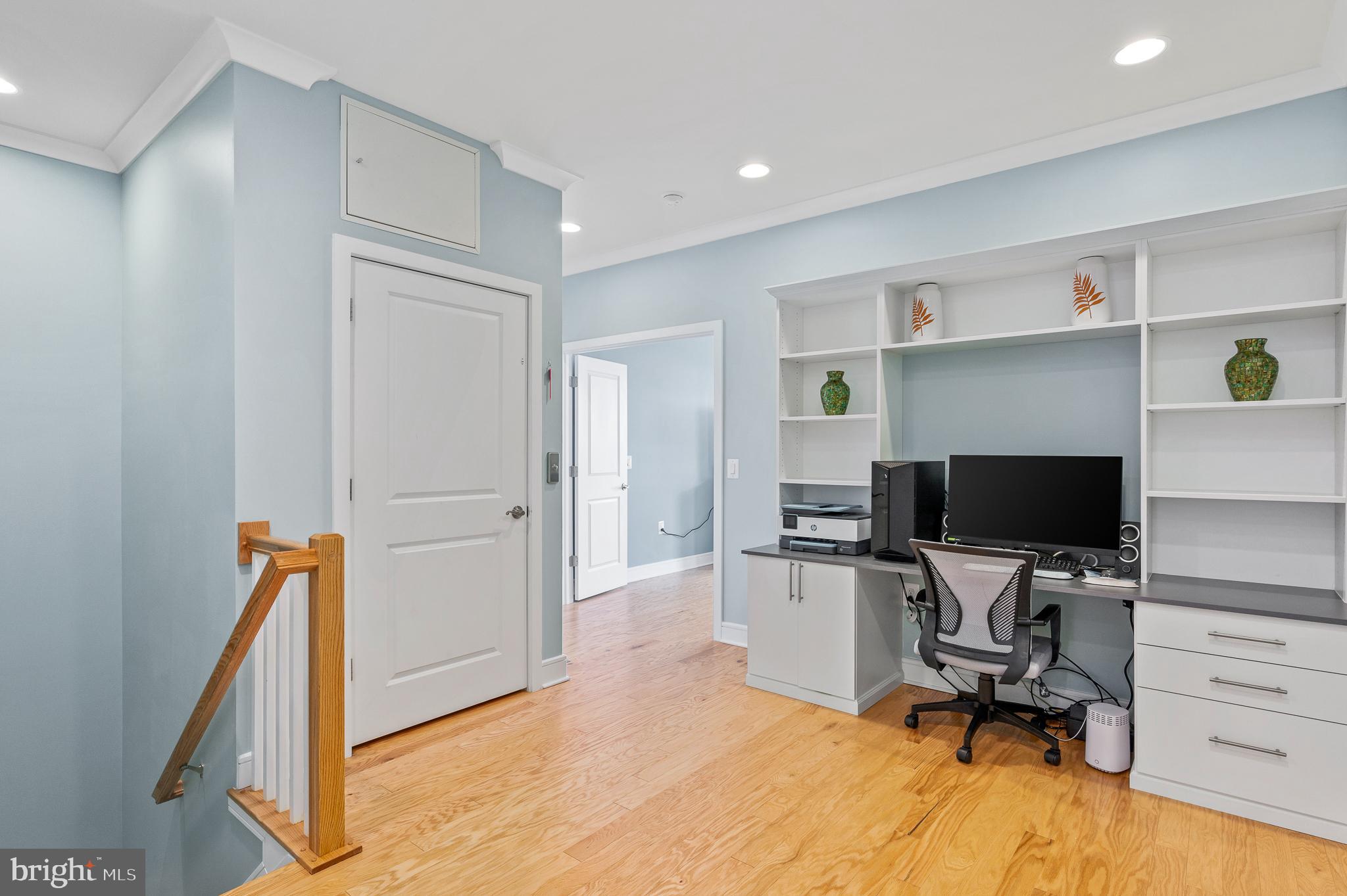 42791 Macbeth Terrace Ashburn, VA 20148 - Photo 19 of 63 a view of a workspace with furniture and a bedroom