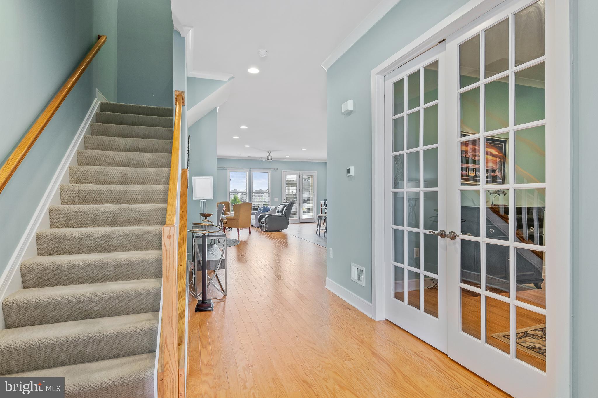 42791 Macbeth Terrace Ashburn, VA 20148 - Photo 2 of 63 a view of staircase with white walls and windows