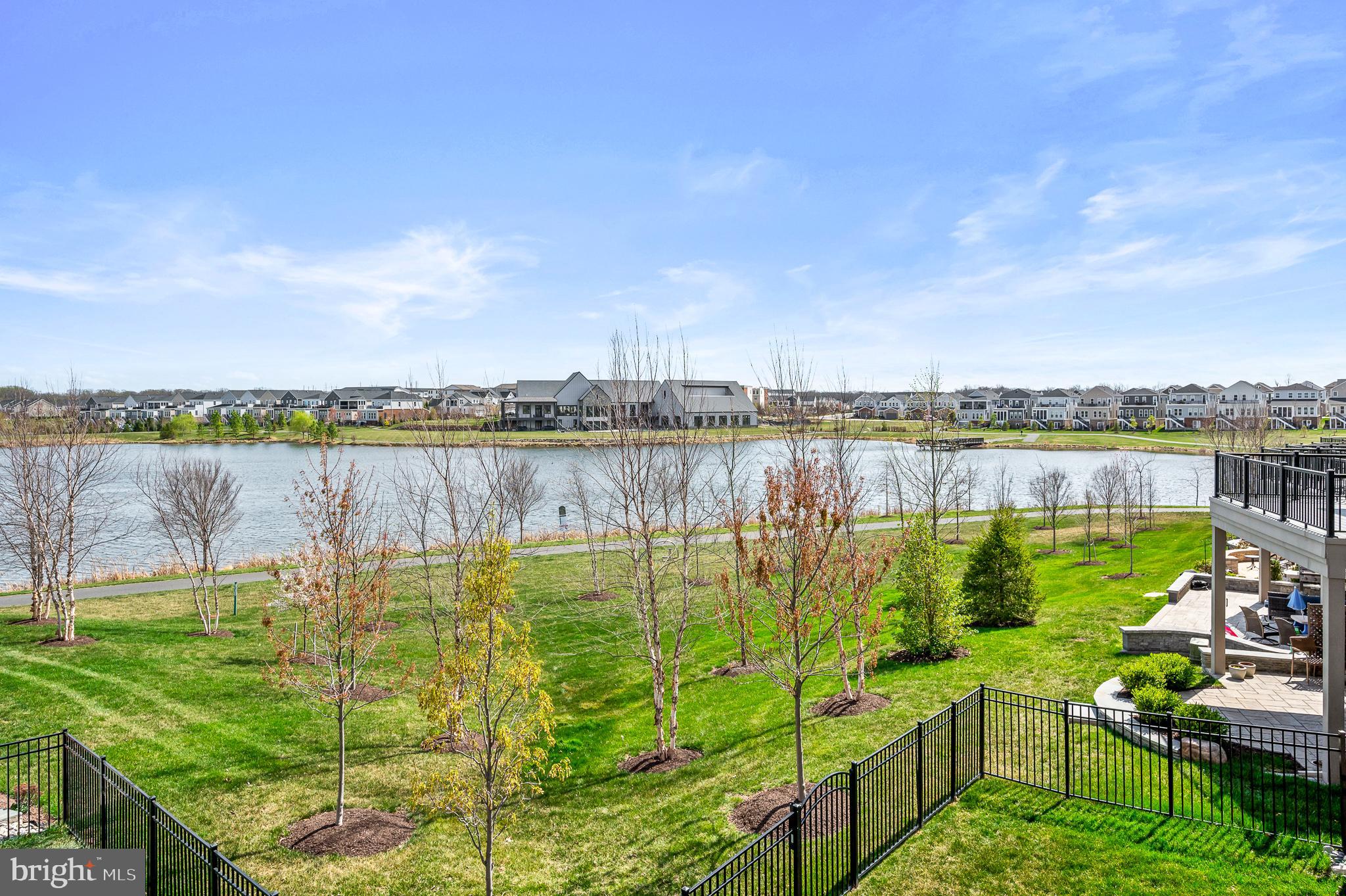 42791 Macbeth Terrace Ashburn, VA 20148 - Photo 27 of 63 a view of a lake with houses in the back