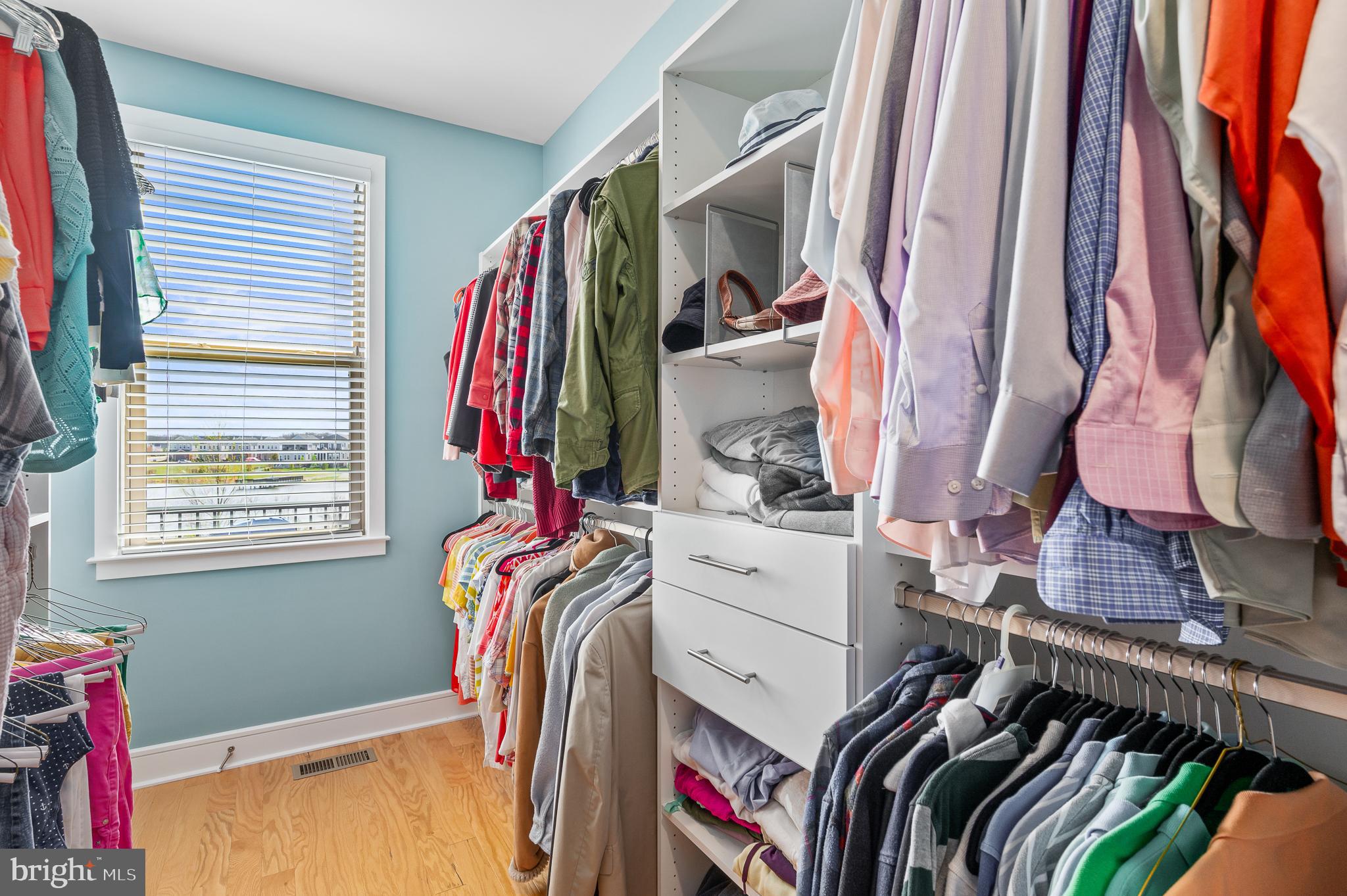 42791 Macbeth Terrace Ashburn, VA 20148 - Photo 30 of 63 a view of walk in closet with clothes and shoes