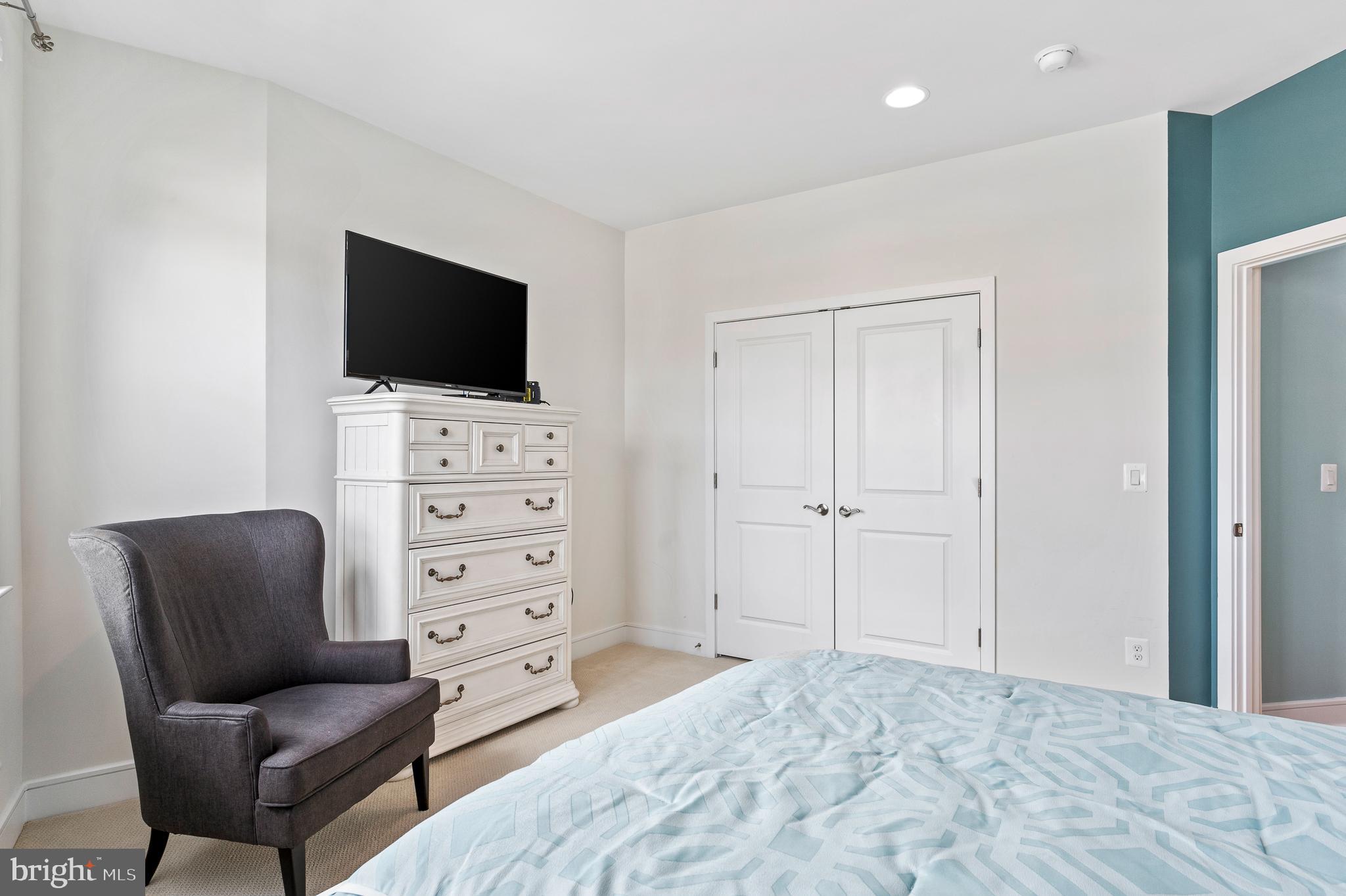 42791 Macbeth Terrace Ashburn, VA 20148 - Photo 34 of 63 a view of livingroom with furniture and a flat screen tv