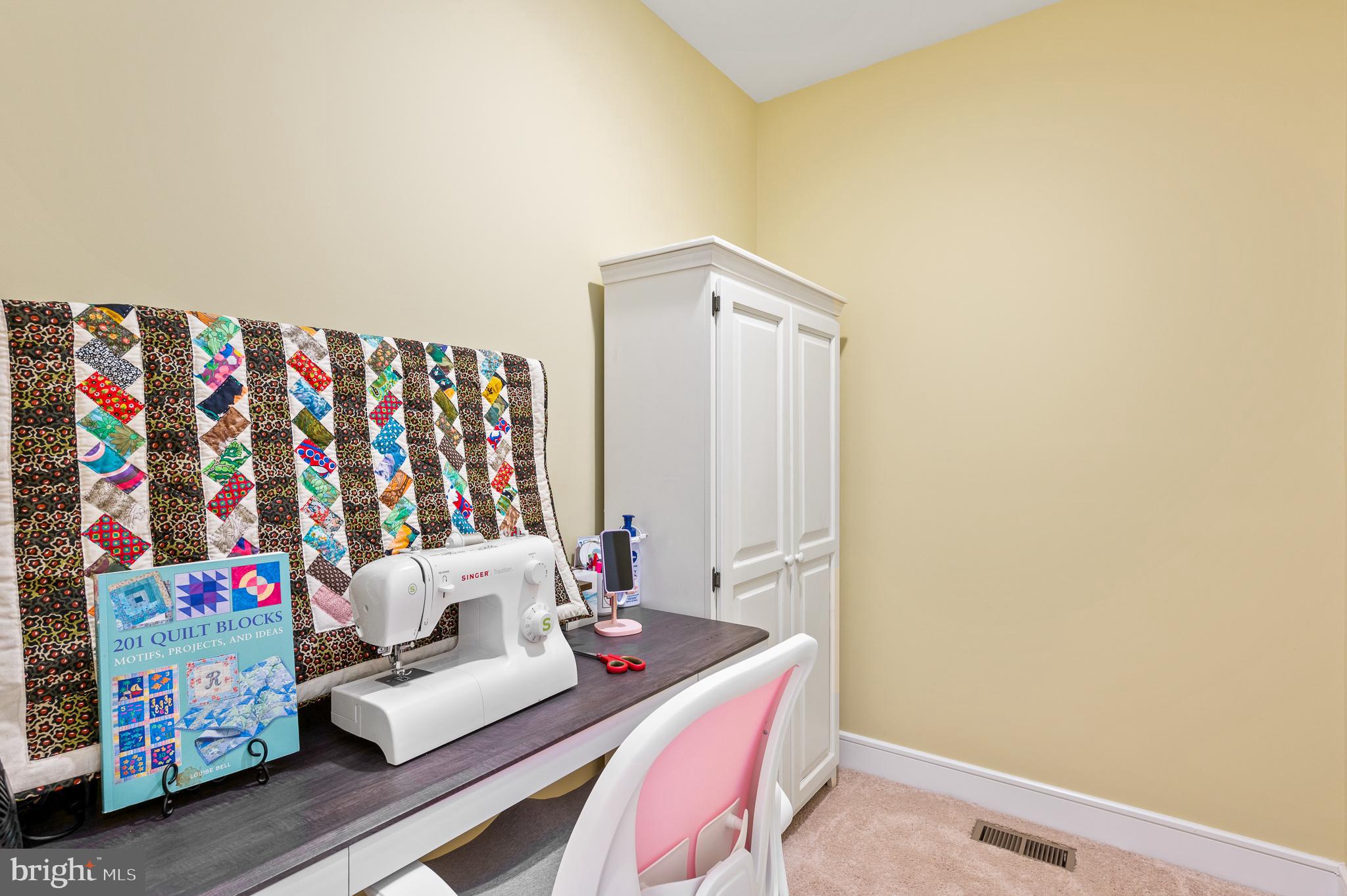 42791 Macbeth Terrace Ashburn, VA 20148 - Photo 42 of 63 a living room with furniture and a table