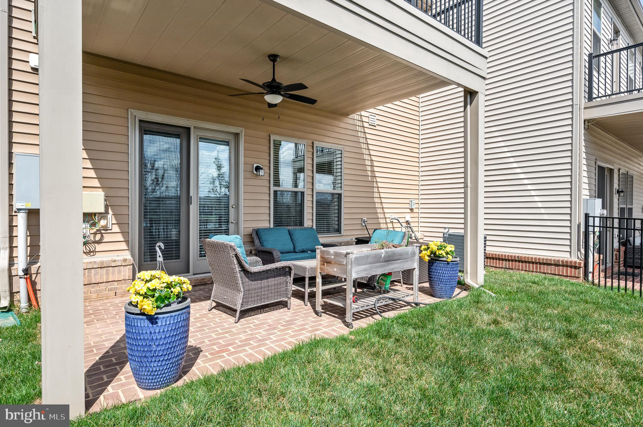 42791 Macbeth Terrace Ashburn, VA 20148 - Photo 45 of 63 a view of a house with backyard and porch