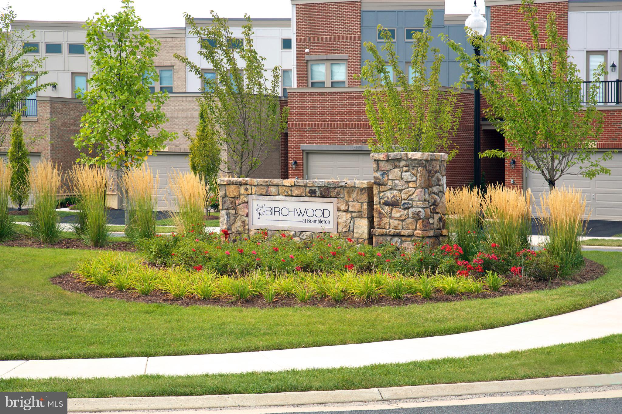 42791 Macbeth Terrace Ashburn, VA 20148 - Photo 53 of 63 a sign on the side of a road