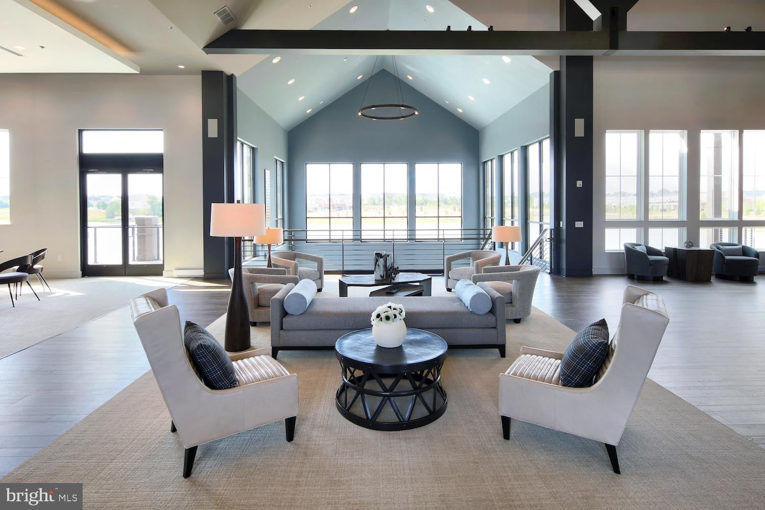 42791 Macbeth Terrace Ashburn, VA 20148 - Photo 56 of 63 a living room with furniture and a large window