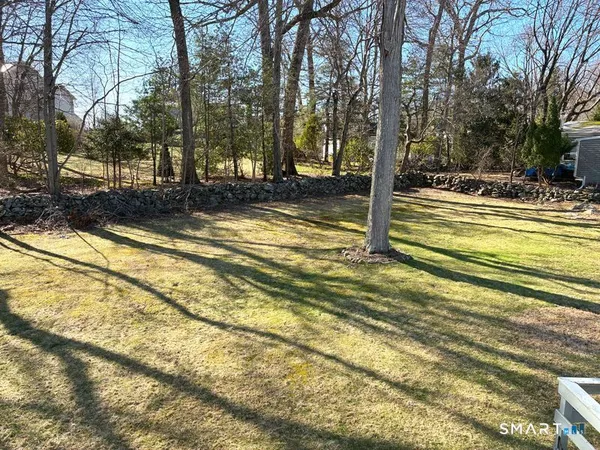 a view of a swimming pool with a house