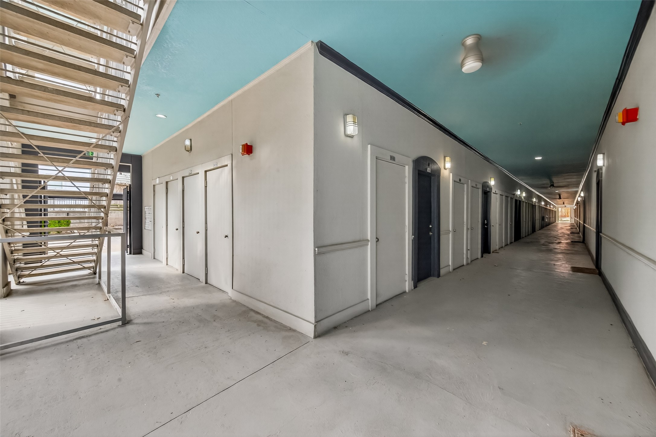 1441 East Street, Unit 308 Houston, TX 77007 - Photo 15 of 42 Covered access areas protect from the elements.