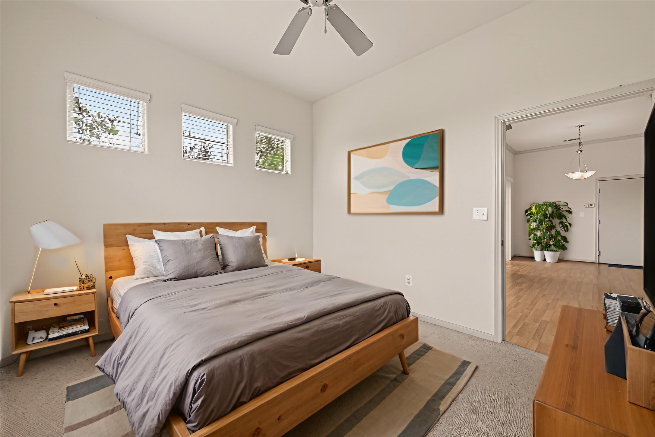 1441 East Street, Unit 308 Houston, TX 77007 - Photo 29 of 42 Lots of East-facing natural light in this bedroom! This photo is virtually staged to show one possible configuration of furniture.