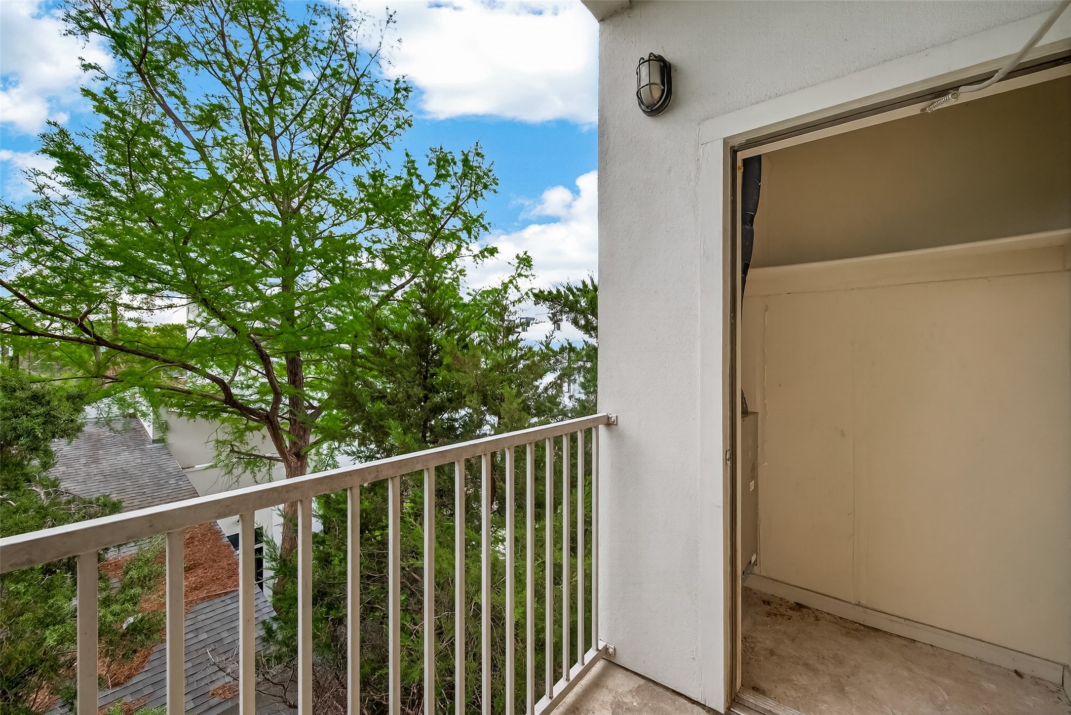 1441 East Street, Unit 308 Houston, TX 77007 - Photo 35 of 42 Additional balcony storage adds everyday convenience.