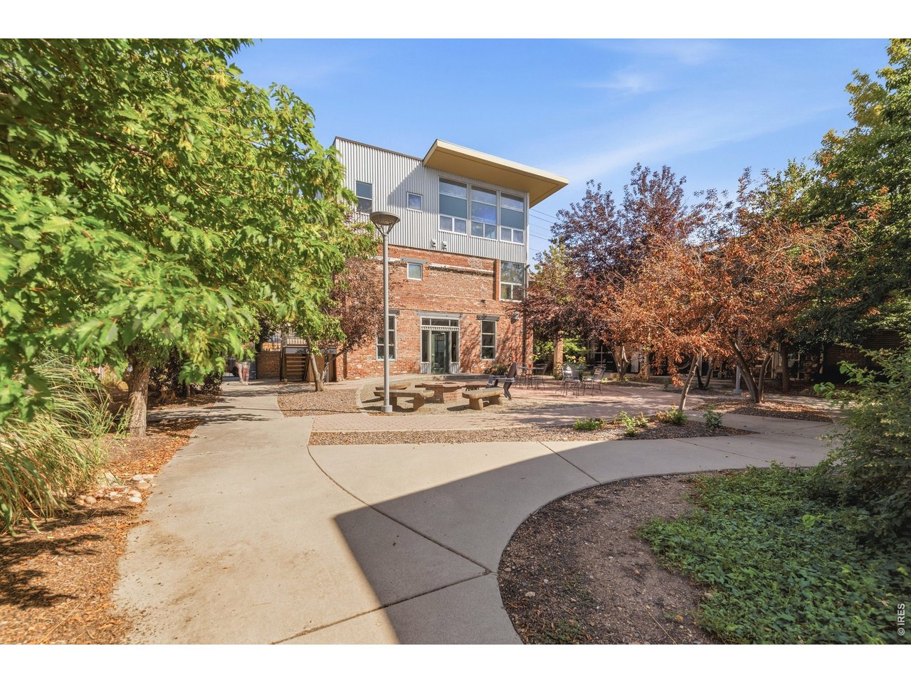 3033 Blake Street, Unit 112 Denver, CO 80205 - Photo 27 of 28 a view of a house with entertaining space